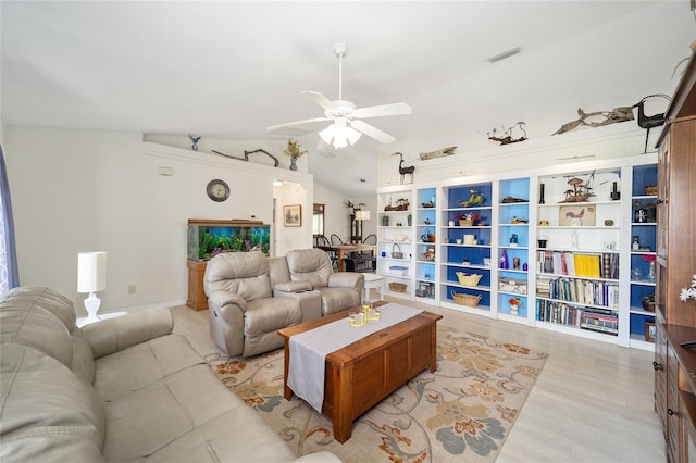 living room with vaulted ceiling, light hardwood / wood-style floors, and ceiling fan