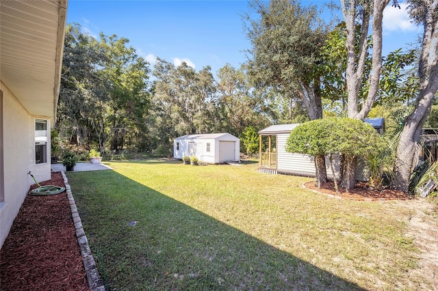 view of yard with a storage unit