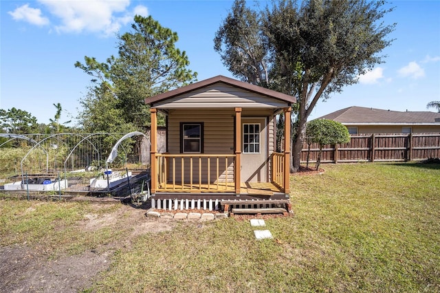 view of outdoor structure with a lawn