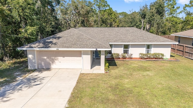 single story home featuring a front lawn and a garage