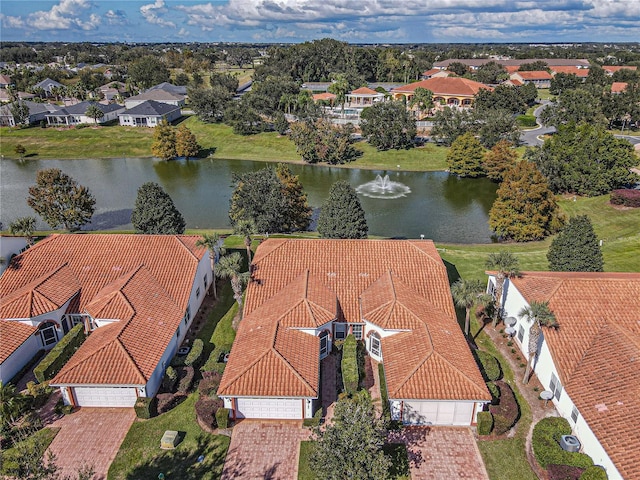 bird's eye view with a water view and a residential view