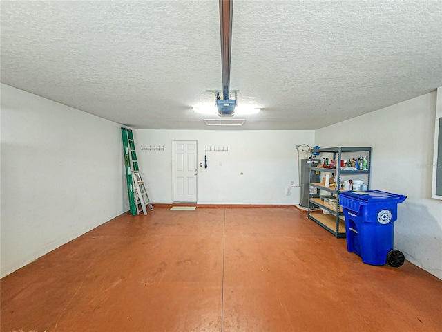 garage with a garage door opener and gas water heater