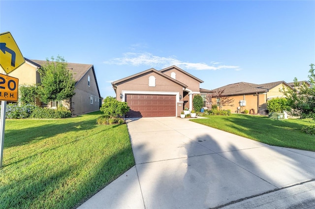 view of front of home featuring a garage and a front yard