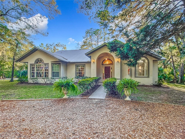 view of front facade with a front yard