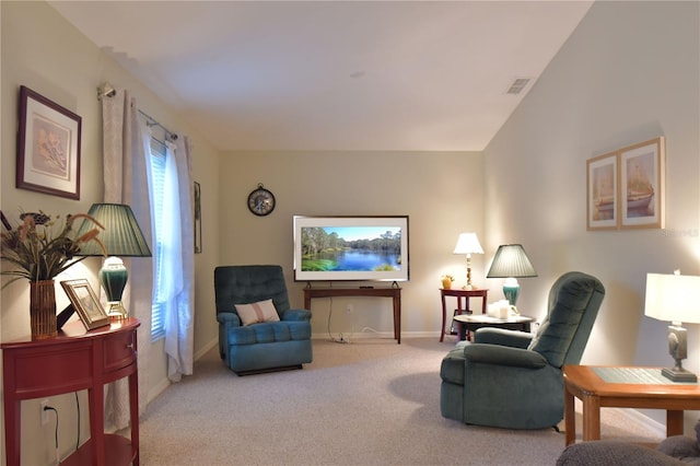 sitting room featuring carpet