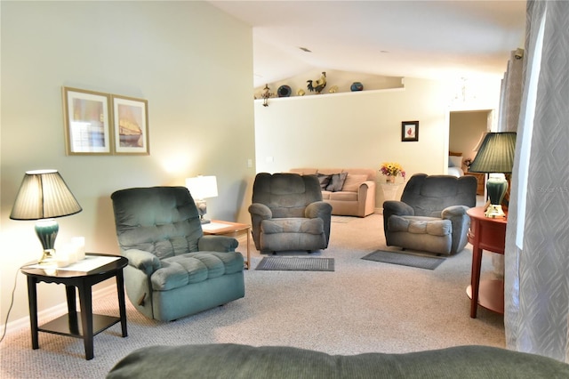 carpeted living room with vaulted ceiling