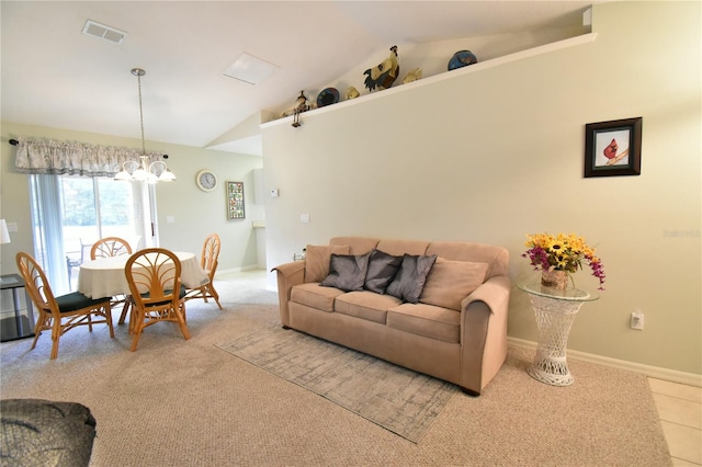 living room featuring lofted ceiling, a chandelier, and light tile patterned flooring