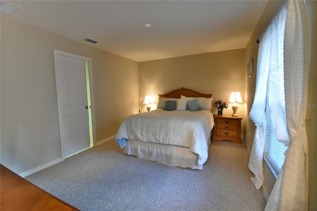 bedroom featuring carpet