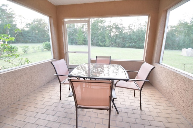 sunroom featuring a healthy amount of sunlight