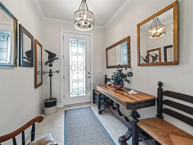 entrance foyer with a chandelier, crown molding, and light tile patterned floors