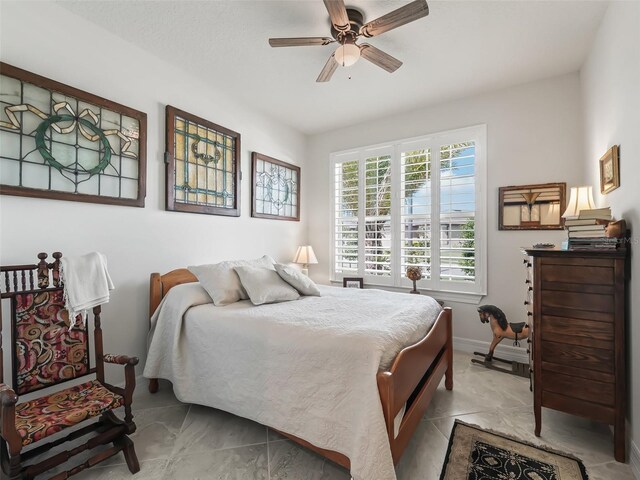 bedroom featuring ceiling fan