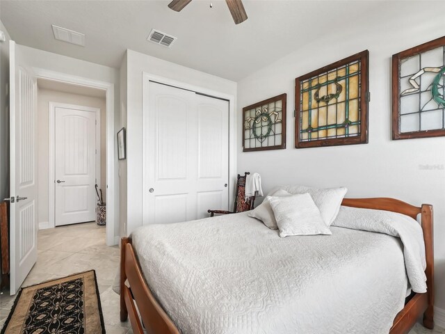 bedroom featuring a closet and ceiling fan