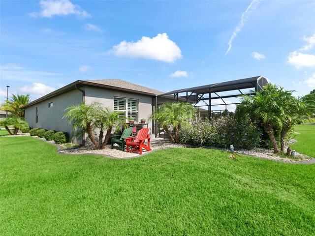 view of yard featuring a lanai