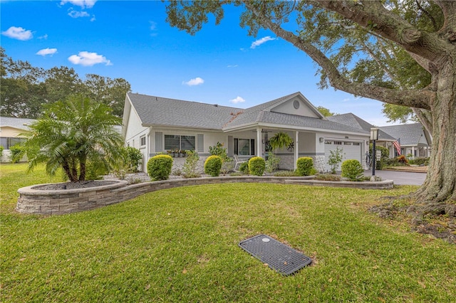 ranch-style house with a front yard and a garage