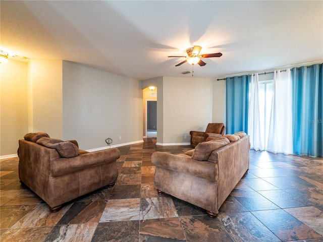 living room featuring ceiling fan