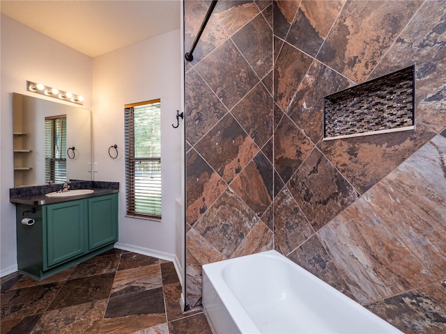 bathroom featuring vanity and tub / shower combination