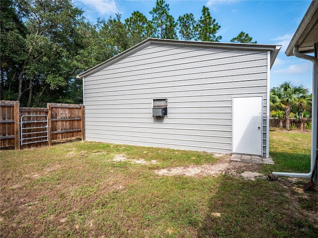 view of side of property with a lawn