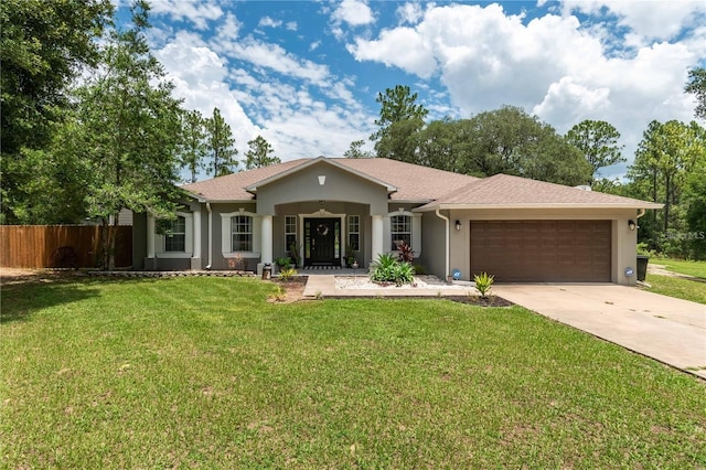 12805 SW 64th Ln, Ocala, FL 34481 - ranch-style home featuring stucco siding, an attached garage, and concrete driveway