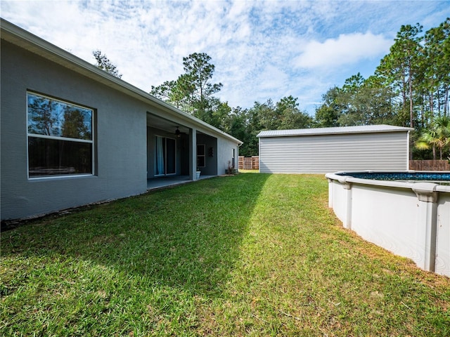 12805 SW 64th Ln, Ocala, FL 34481 - view of grassy yard featuring an outdoor pool
