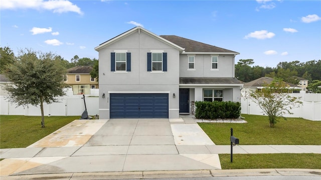 front of property with a garage and a front lawn