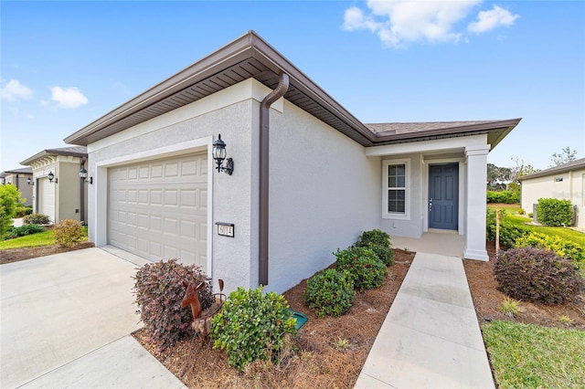 ranch-style home with a garage