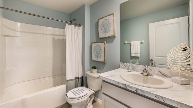 full bathroom featuring toilet, shower / tub combo with curtain, and vanity