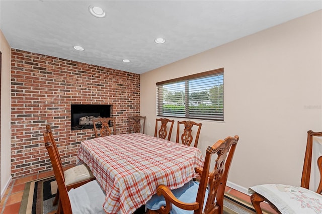 dining area with brick wall