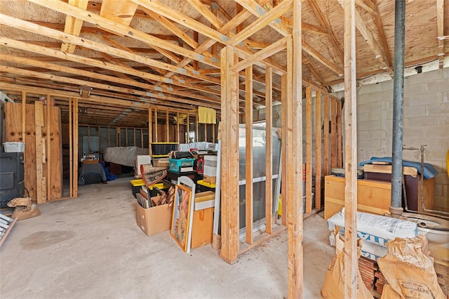 misc room with concrete flooring