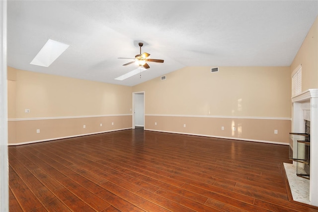 unfurnished living room with ceiling fan, lofted ceiling, and dark hardwood / wood-style floors