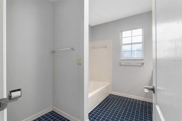 bathroom with tile patterned floors