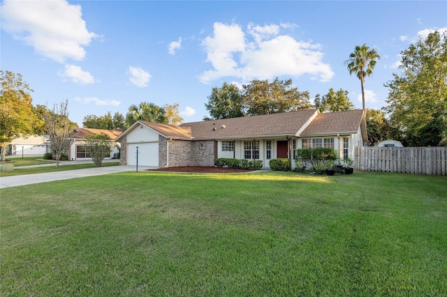 single story home with a front lawn and a garage