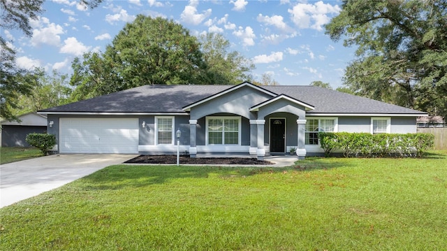 single story home with a front lawn and a garage