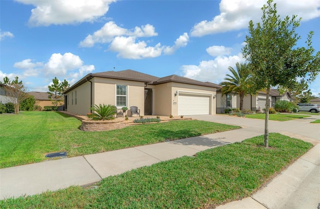 view of front of house with a front yard and a garage