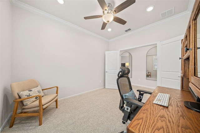 carpeted office with ornamental molding and ceiling fan