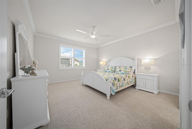 carpeted bedroom featuring crown molding and ceiling fan