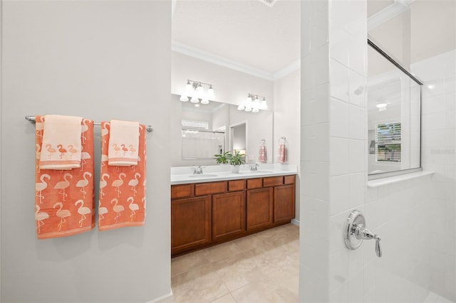 bathroom with vanity, a shower with shower door, ornamental molding, and plenty of natural light