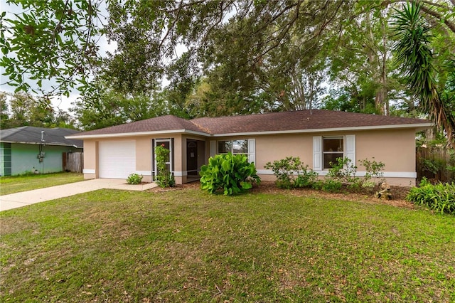 ranch-style home with a garage and a front lawn