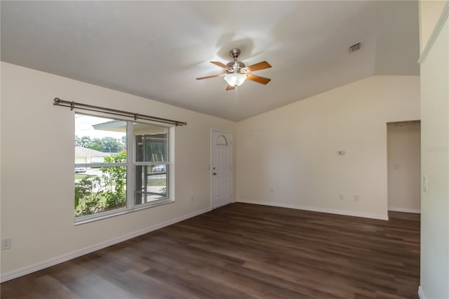 unfurnished room featuring dark wood-type flooring, ceiling fan, and vaulted ceiling