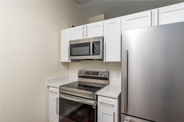 kitchen featuring white cabinets and stainless steel appliances