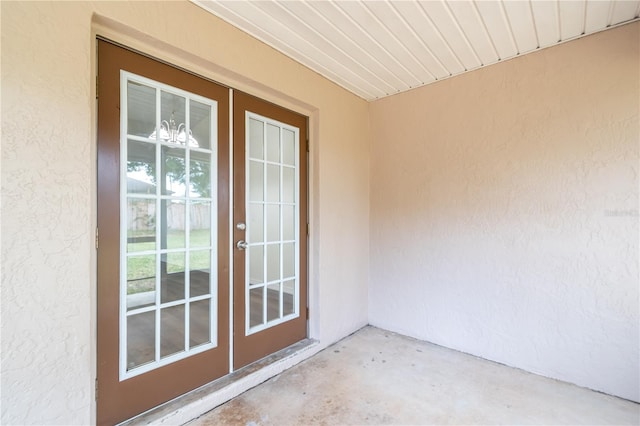 entrance to property with french doors and a patio area