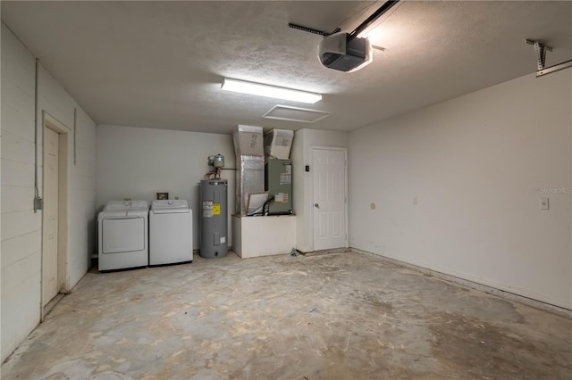 garage featuring a garage door opener, electric water heater, heating unit, and washing machine and clothes dryer