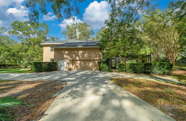 view of property exterior with a garage