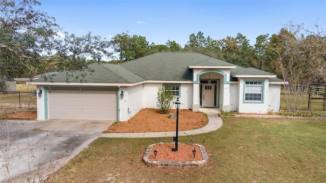 single story home featuring a front yard and a garage