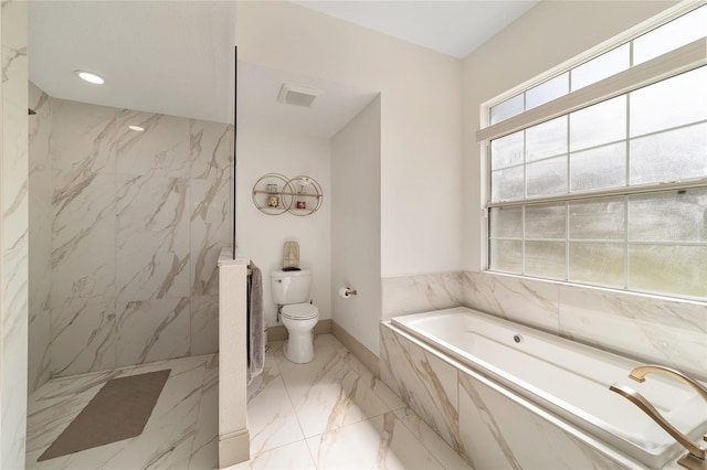 bathroom with toilet and a bathtub