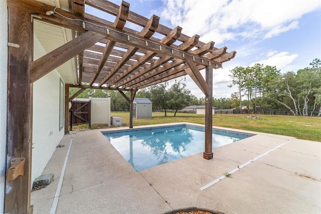 view of swimming pool featuring a patio area, a storage shed, a lawn, and a pergola