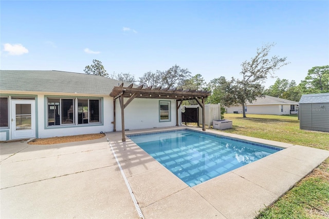 view of pool with a patio area, a yard, and a pergola