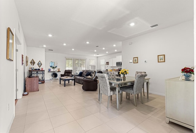 view of tiled dining space