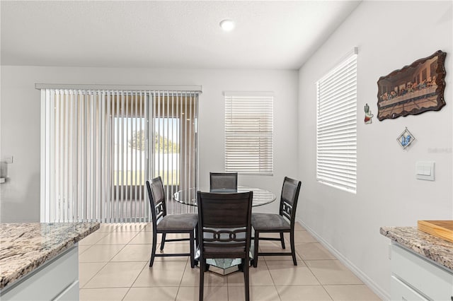 view of tiled dining space