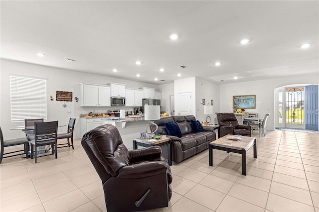 living room featuring light tile patterned floors