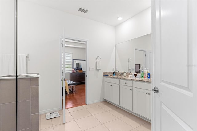 bathroom featuring vanity and tile patterned floors